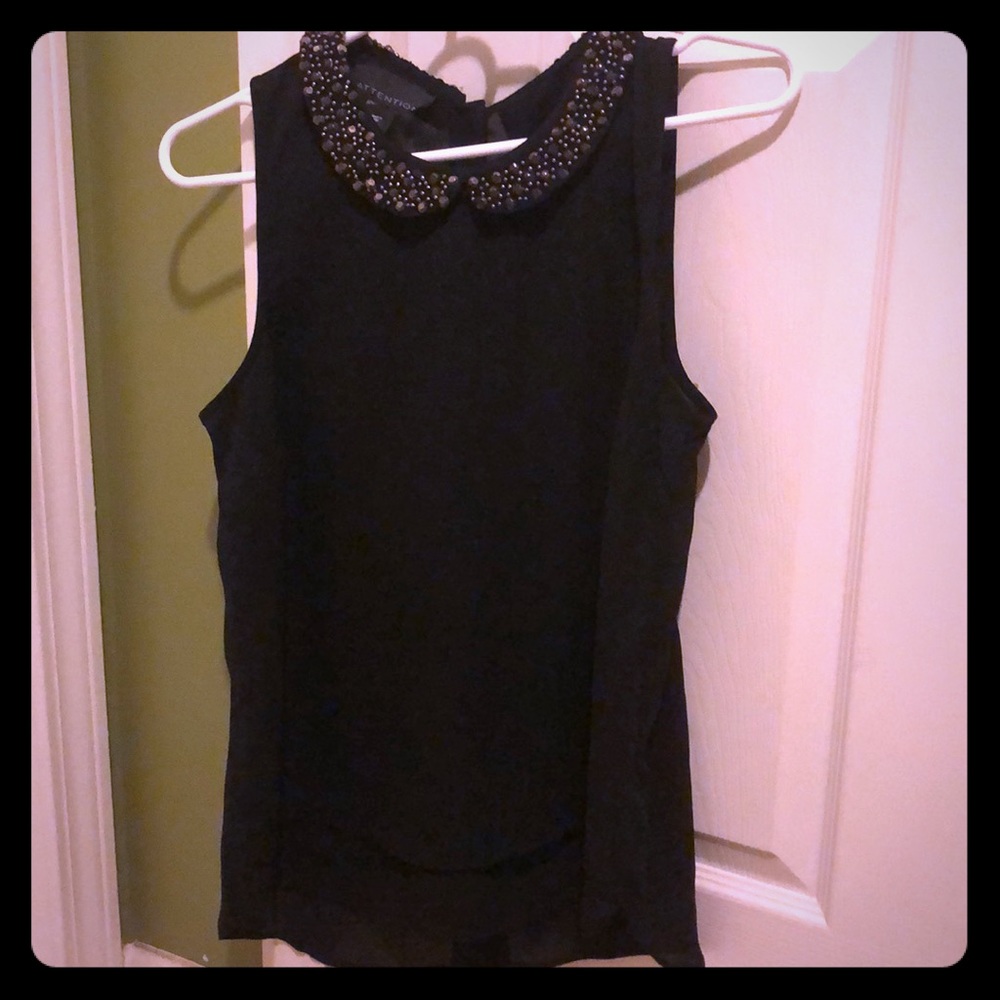 Studded color sleeveless top